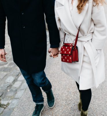 Couple holds hand