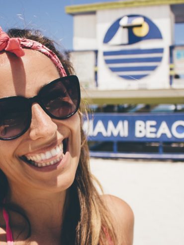 Women smiling on the beach