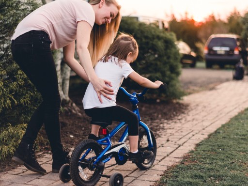 how to teach a kid to ride a bike with training wheels