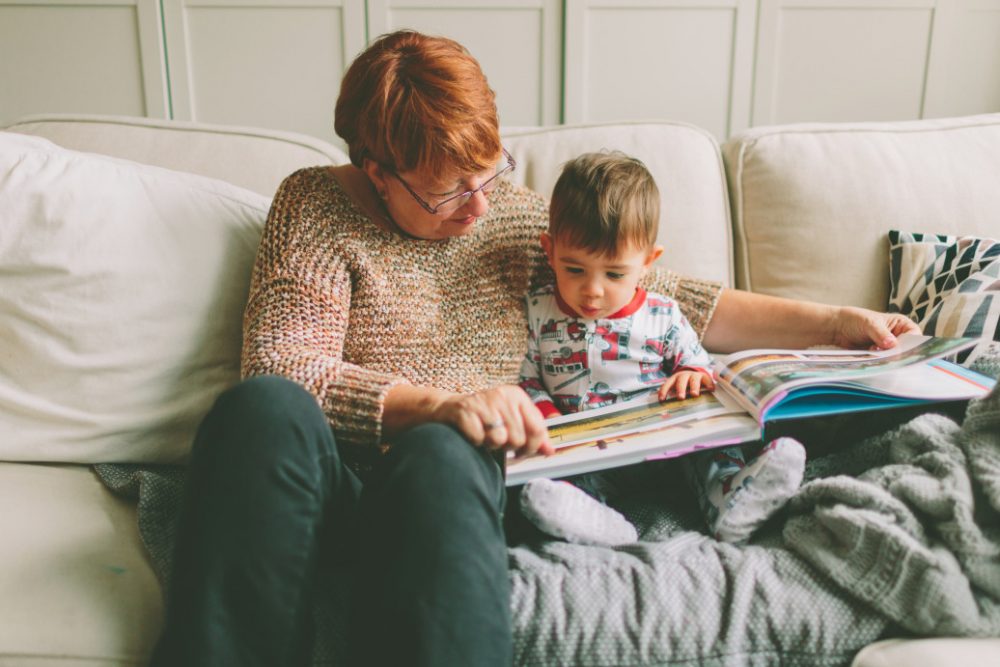 grandma reads with baby