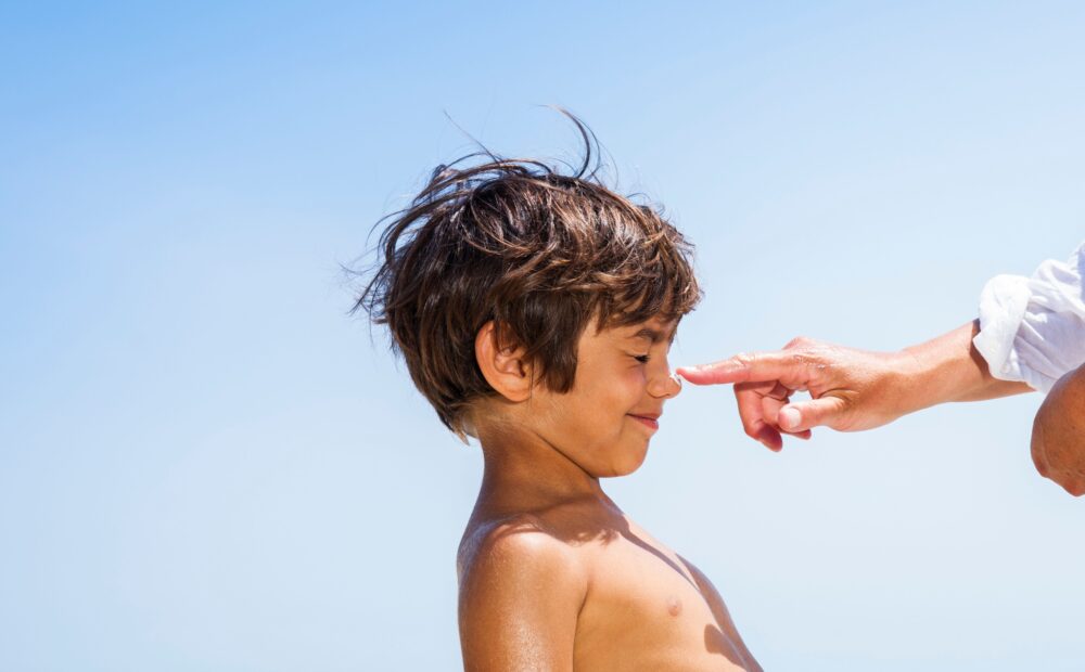 tips and trick to summer travels with kids sunscreen