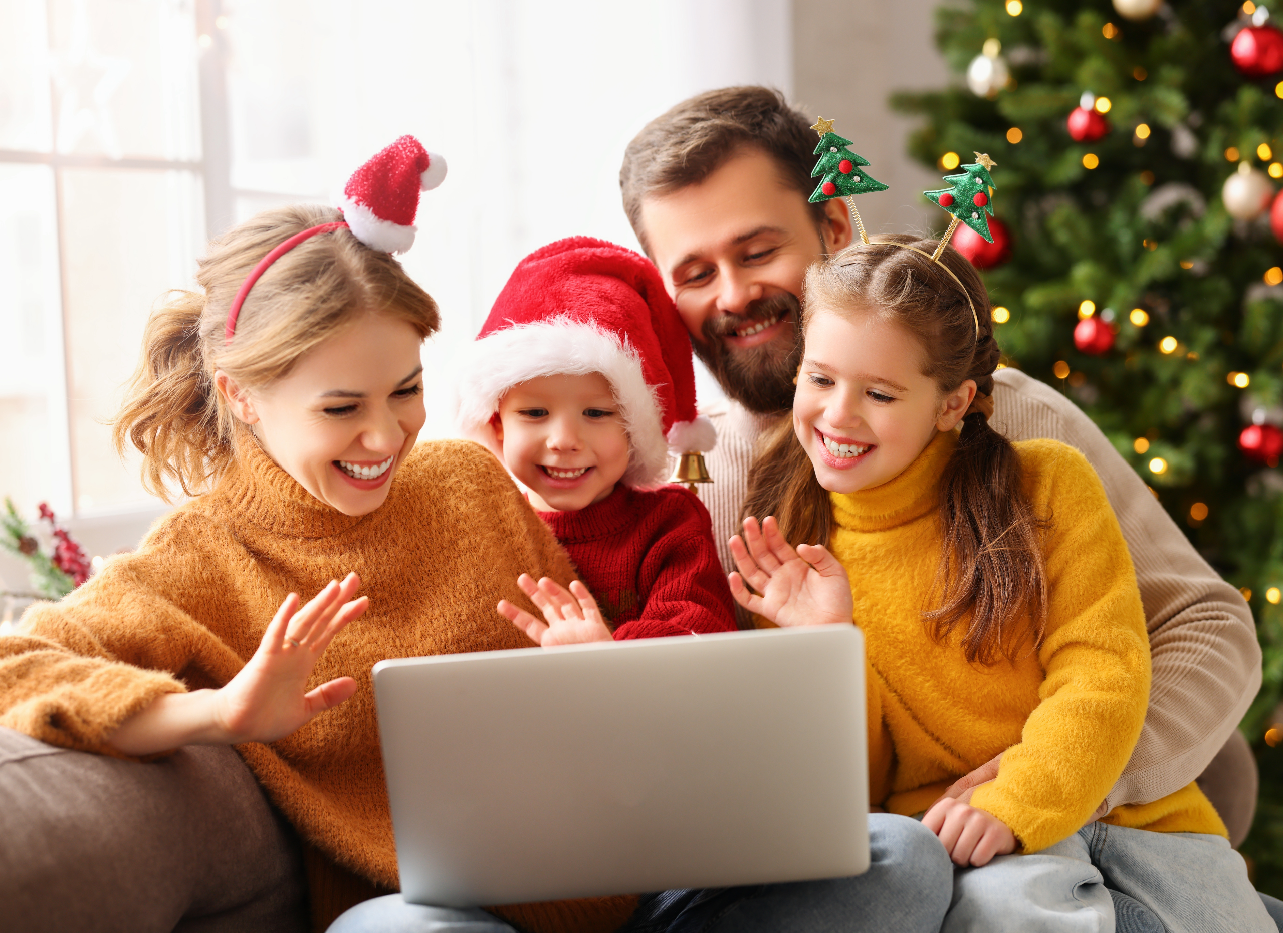 Family video calling loved ones for Christmas.